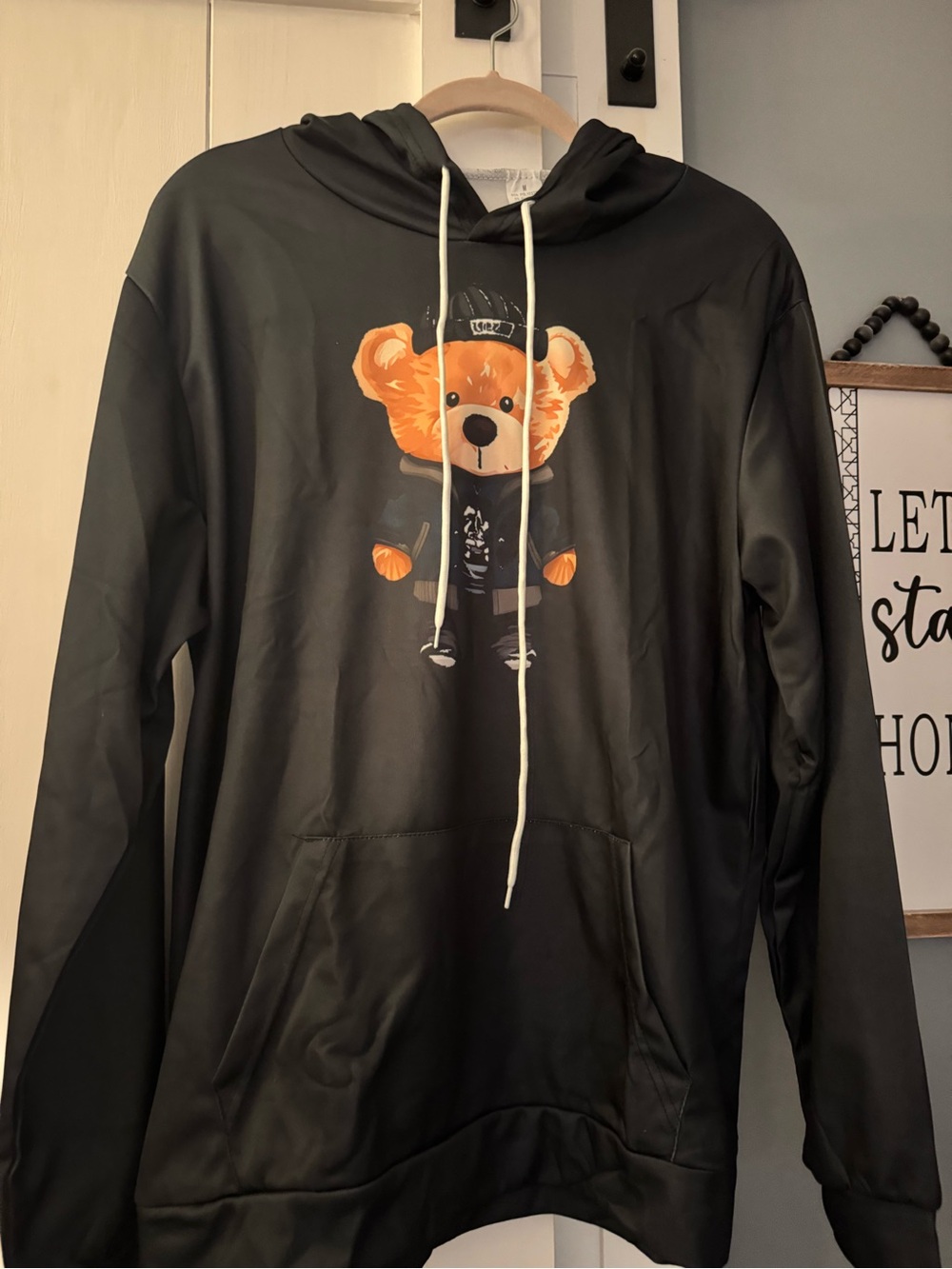 Black Hoodie with Orange Teddy Bear Graphic